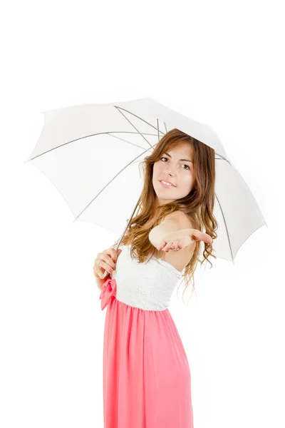 Чарівна молода жінка тримає парасольку в елегантній сукні — стокове фото