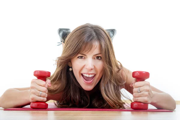 Fit athletic girl with weights or dumbbells wearing sports cloth — Stock Photo, Image