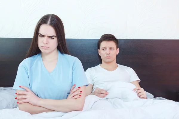 Emotionally hurt  woman is angry while man in background struggl — Stock Photo, Image