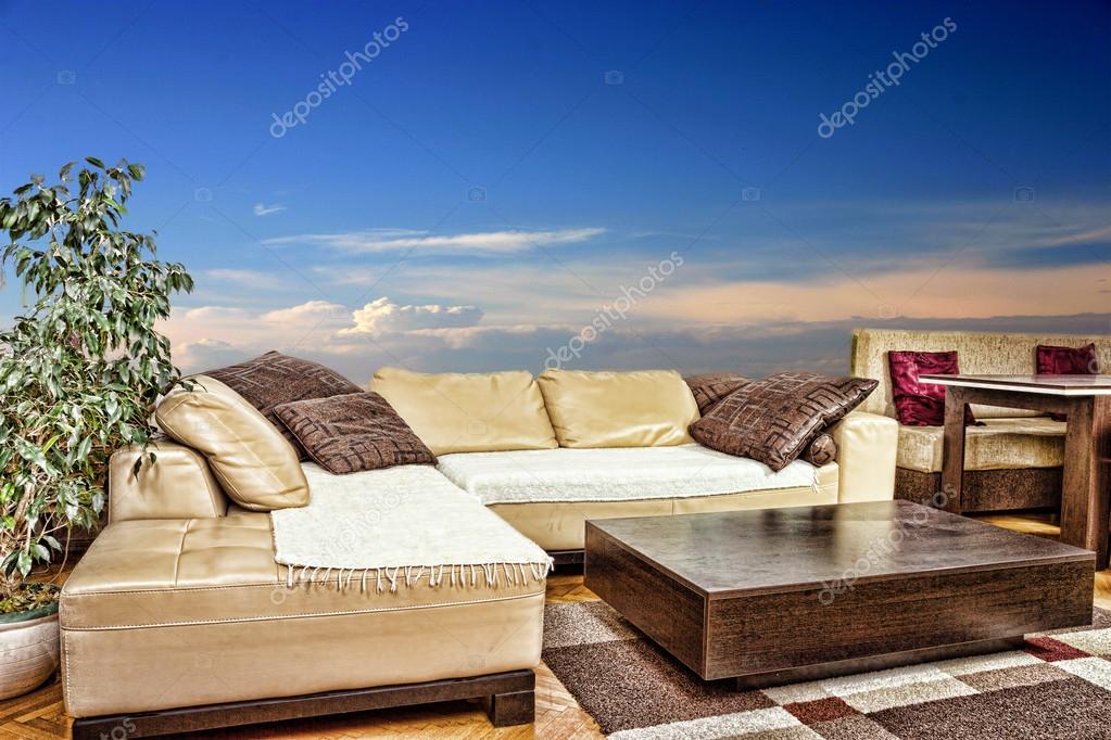 Empty living room with angular or corner sofa and low table Stock Photo by  ©feelphotoartz 77473096