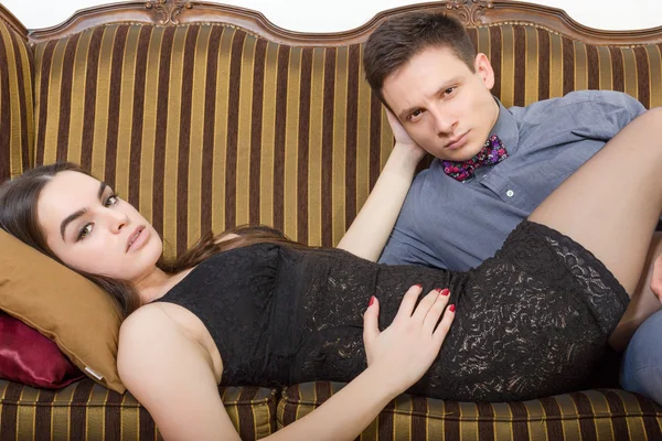 Young man and woman In sexy edition looking seductively — Stock Photo, Image