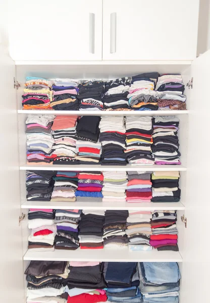 Dressing White Closet with Clothes Arranged Neatly Thickly Order Stockafbeelding