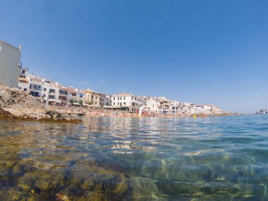View of the town of Calella de Palafrugell from inside the water