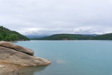 Landscape of the San pon swamp of turquoise water with cloudy sky