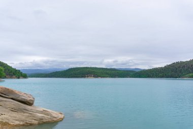 Landscape of the San pon swamp of turquoise water with cloudy sky