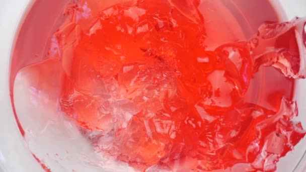 Image Aérienne Bol Verre Avec Gelée Fraises Filant Sur Fond — Video