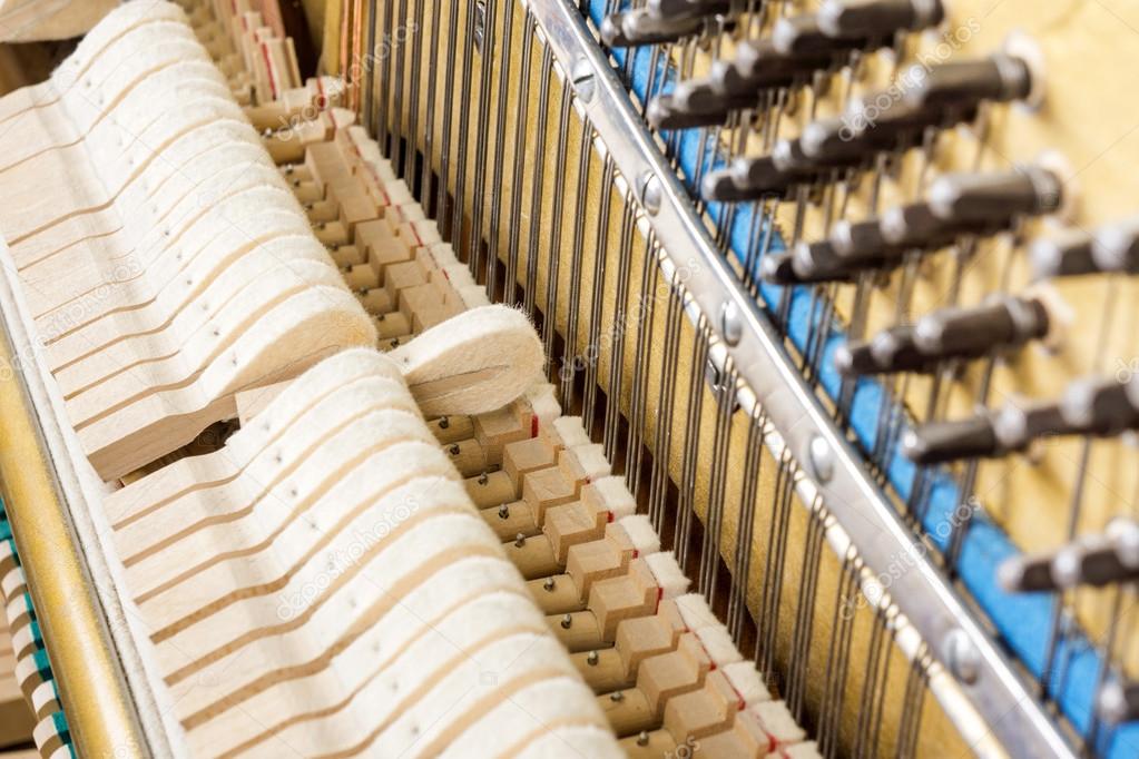 Pattern of hammers and strings inside piano