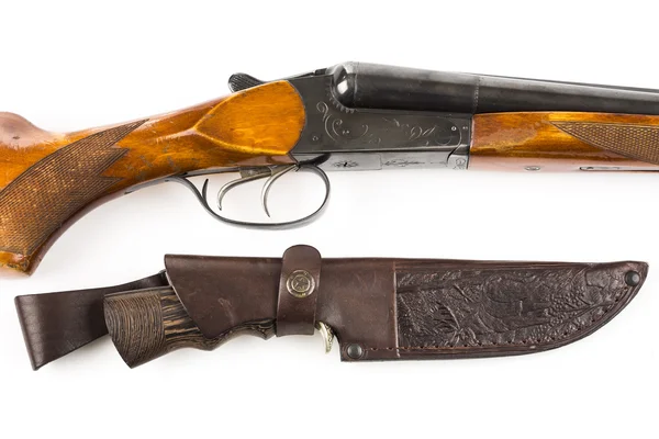 Hunting rifle and knife in leather case — Stock Photo, Image