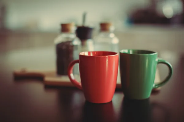 Cup on the kitchen table — Stock Photo, Image