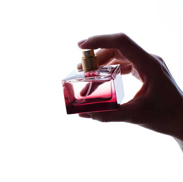 Perfume nas mãos das mulheres — Fotografia de Stock