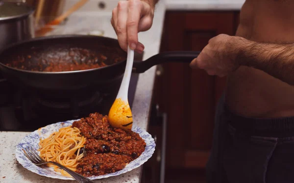 Handsome Man Cooking Pasta Home — Stock Photo, Image