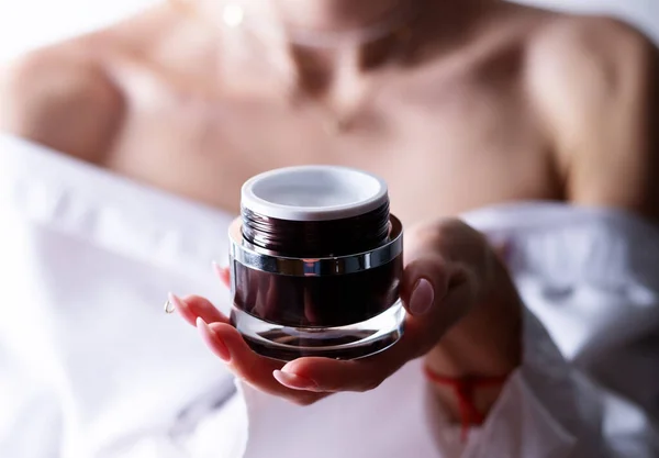 Young Woman Holding Face Cream — Stock Photo, Image