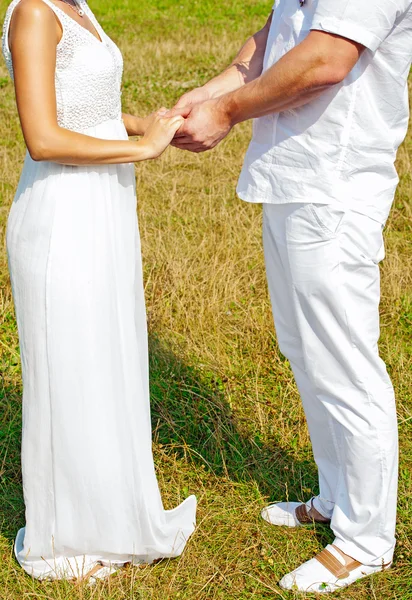 Wedding couple holding hands — Stock Photo, Image