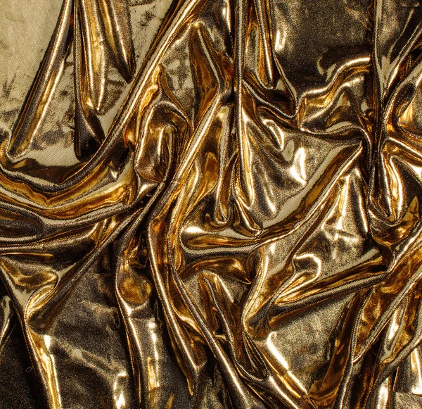 Gouden stof textuur — Stockfoto