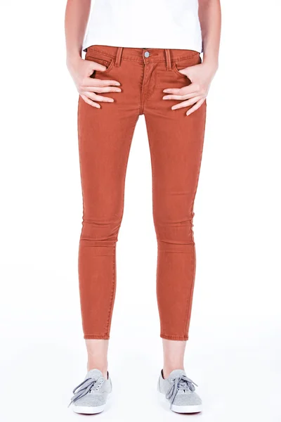 Lány a stílusos jeans fehér alapon — Stock Fotó