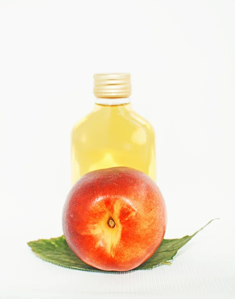 Cosmetic oil peach — Stock Photo, Image