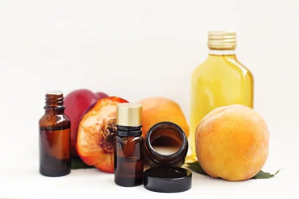 Multiple peach oil. Body care — Stock Photo, Image