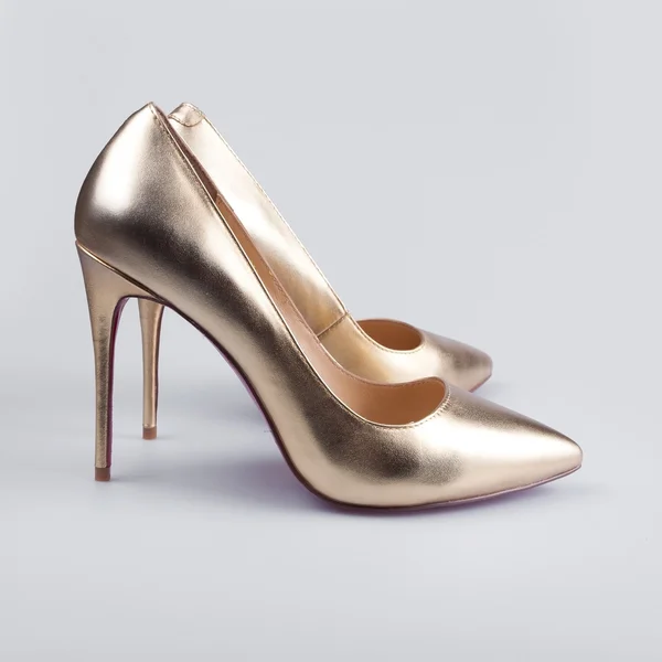 Złote buty — Zdjęcie stockowe
