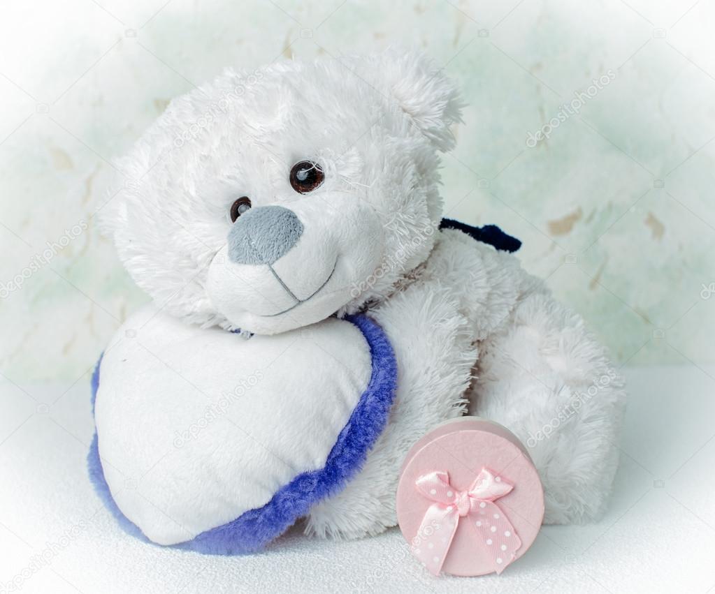 Teddy bear and gift boxes