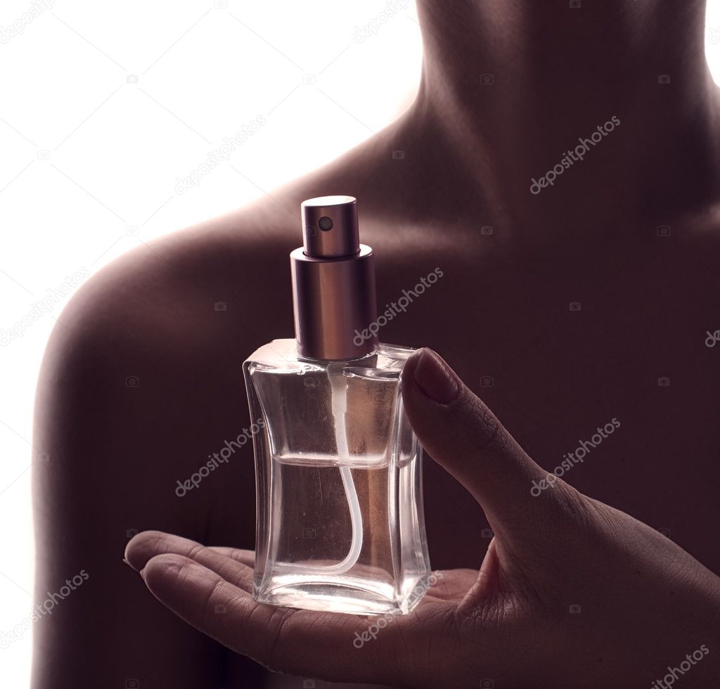 Girl and perfume closeup