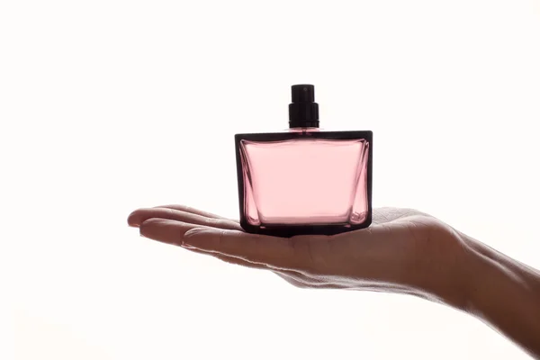 Perfume in hand — Stock Photo, Image