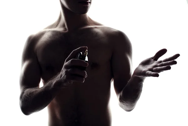 Hombre con frasco de perfume — Foto de Stock