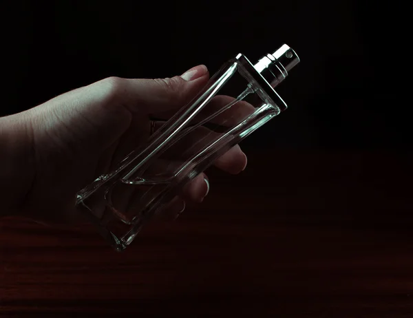 perfume in a female hand