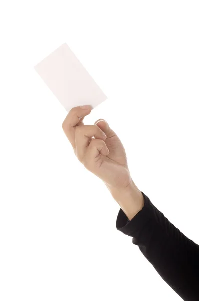 女性の手が、白い背景で隔離の紙のカードを保持しています。 — ストック写真