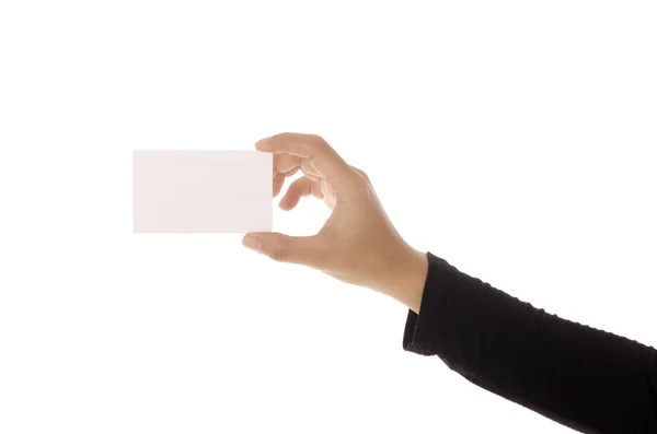 女性の手が、白い背景で隔離の紙のカードを保持しています。 — ストック写真