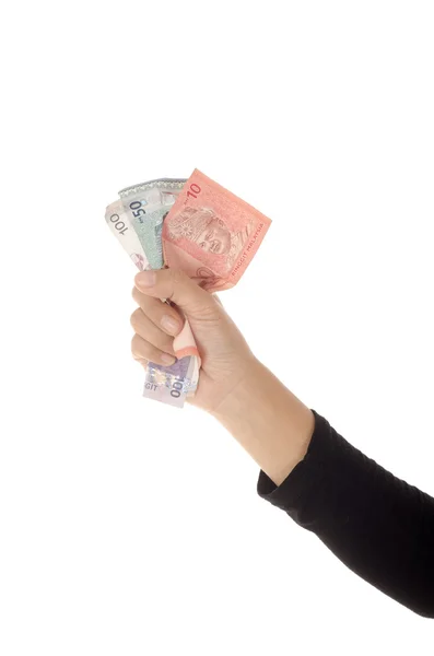 Beyaz arka plan üzerinde izole banknotlar sıkma el