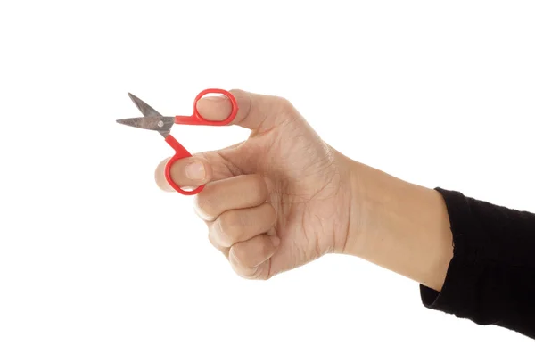 Woman hand holding a small scissors — Stock Photo, Image