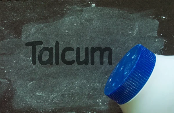 Talcum powder and write word talcum — Stock Photo, Image