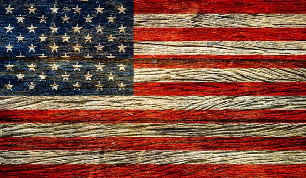 Американский флаг на гранжевом деревянном фоне — стоковое фото