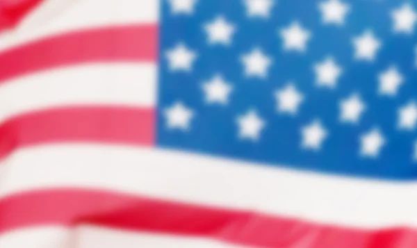 Американский флаг вне фокуса — стоковое фото