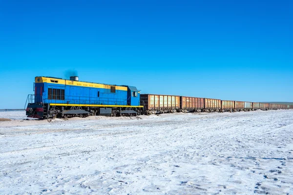 Train on the lake Baskunchak. — Stock Photo, Image