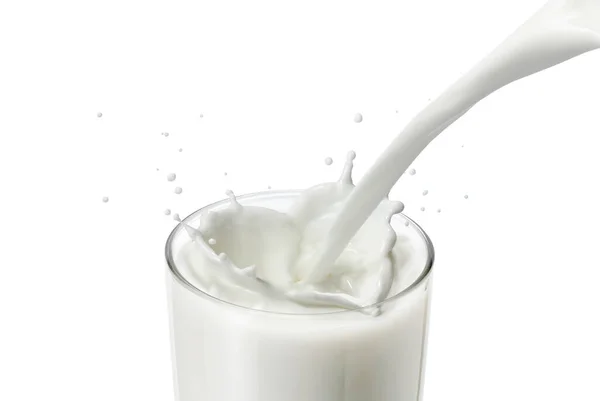 一杯牛奶情人 牛奶倒出浪花 溅出心形 爱情的征象 在玻璃杯中倒入牛奶会产生心形的水花 显示健康食品 鲜牛奶和早餐饮品概念的爱情标志 — 图库照片