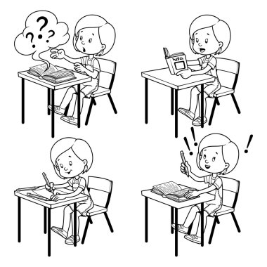 Cute schoolgirl behind a school desk.