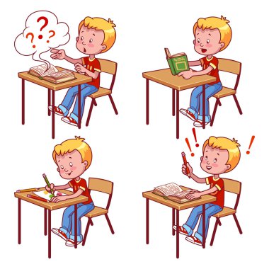 Cute schoolboy behind a school desk.