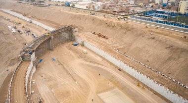 Lima, Peru - October 06, 2019: Aerial view of construction of highway Costa Verde, San Miguel district, road on the beach. clipart