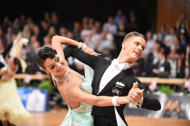 Ballroom dance couple dancing at the competition clipart