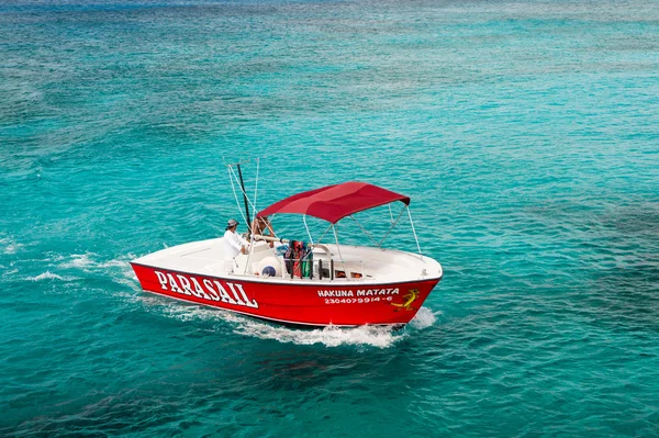 Red motor boat on water — Stock Photo, Image