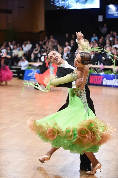 Dance couple in a dance pose during Grand Slam Standart — Stock Photo, Image