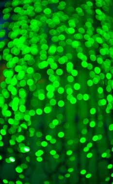 Odaklanamayan yeşil ışık bokeh arkaplanı