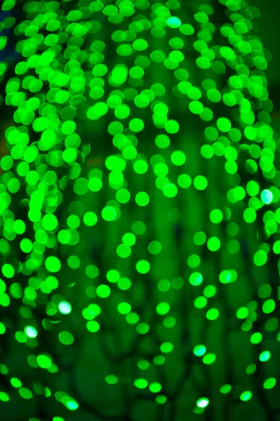 Фон ігристого розфокусованого і розмитого світла абстрактного боке зеленого кольору — стокове фото