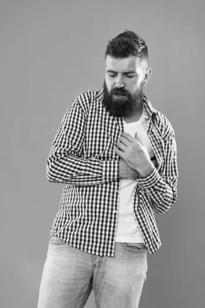 Symptoms of myocardial infarction. Heartache and chest pain. Healthcare. Preventing heart disease. Oh my heart. Bearded man suffer from heart pain. Hipster hold hand on heart. Cardiovascular health — Stock Photo, Image