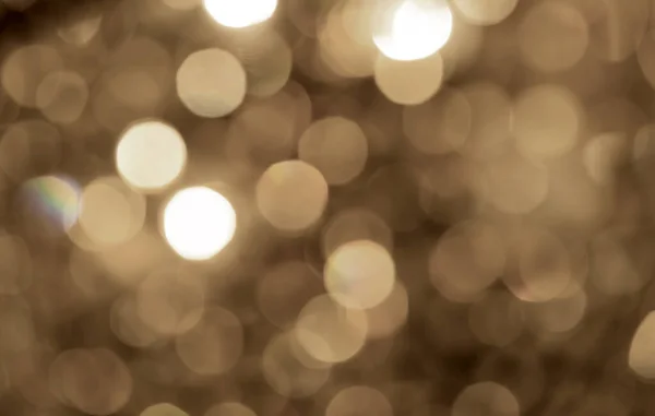 Hintergrund des goldenen defokussierten Lichts Bokeh — Stockfoto