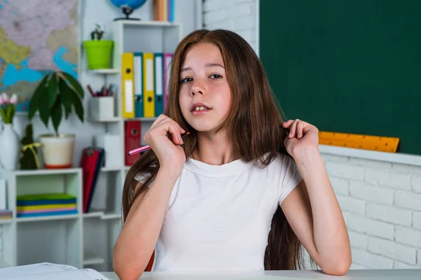 Stylish schoolgirl studying homework during lesson online education concept, study well — Stock Photo, Image