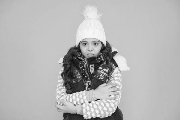 Stay active. it is cold outside. kid warm knitwear. winter vibes. Portrait of girl hipster. Youth street fashion. Winter flue. feeling cold this season. Dress in layers and wear hat. Winter dreaming