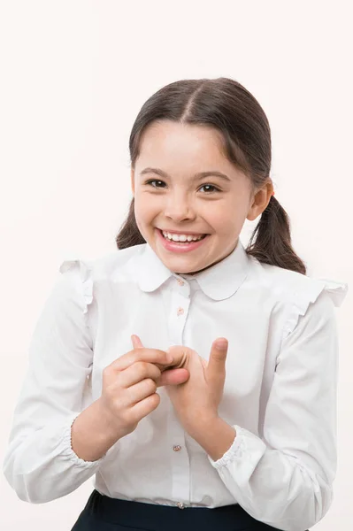 Girl counting on fingers. First of all. Girl school uniform smiling face yellow background. Girl happy back to school. Child ready back to school end continue fun. Schoolgirl formal outfit looks cute — Stock Photo, Image