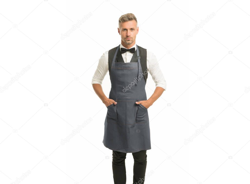 Hospitality staff. Barista handsome worker. Man cook wear apron. Mature barista. Restaurant staff. Hipster professional barista apron uniform. Waiter or bartender. Cafe bar barista job position